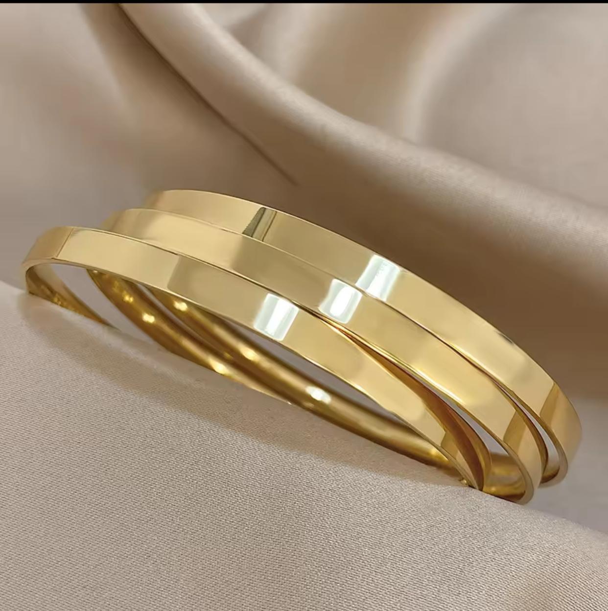 Trio of Glossy Golden Stainless Steel Bangles