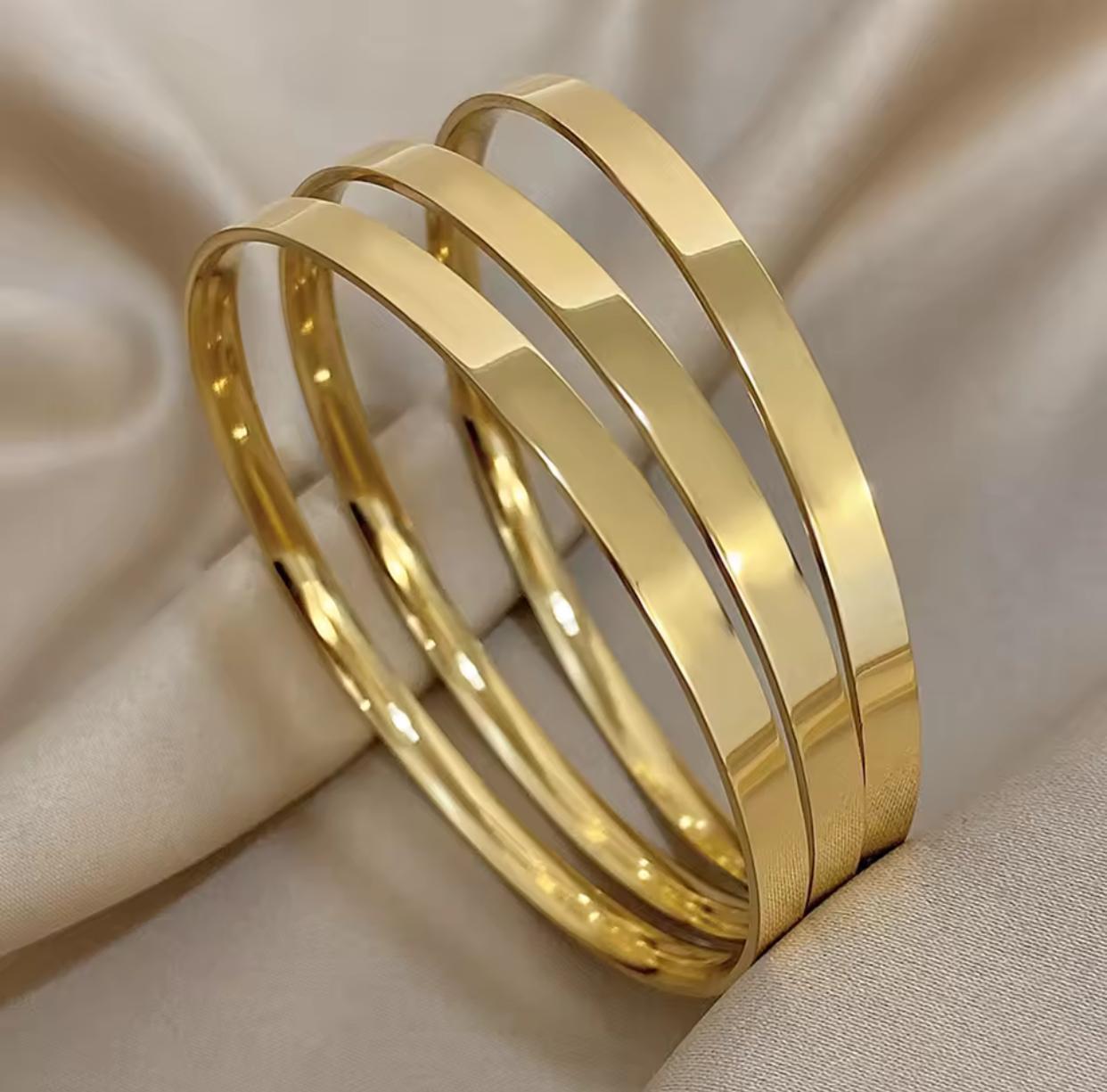 Trio of Glossy Golden Stainless Steel Bangles